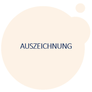 Orangener Farbklecks: Auszeichnung